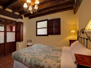 Bedroom with balcony in the holiday house for 10 people in Llanes