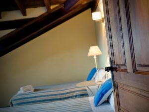 Bedroom in the holiday house for 10 people in Llanes